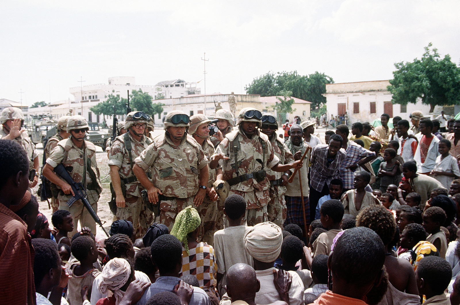 <i>Image Source: <a href='https://picryl.com/media/a-marine-colonel-addresses-with-the-aid-of-an-interpreter-a-group-of-somalis-6a76dc'>The U.S. National Archives</a></i>