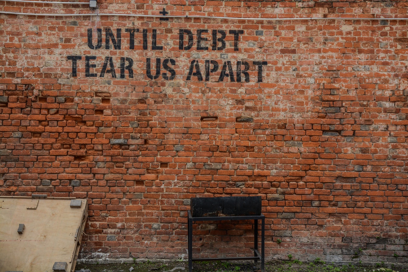 <i>Until debt tear us apart by <a href='https://unsplash.com/@stri_khedonia'>Alice Pasqual</a> on <a href='https://unsplash.com/photos/Olki5QpHxts'>Unsplash</a></i>